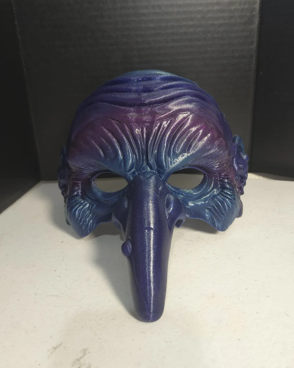 Violet and blue plague doctor mask with a long hooked beak